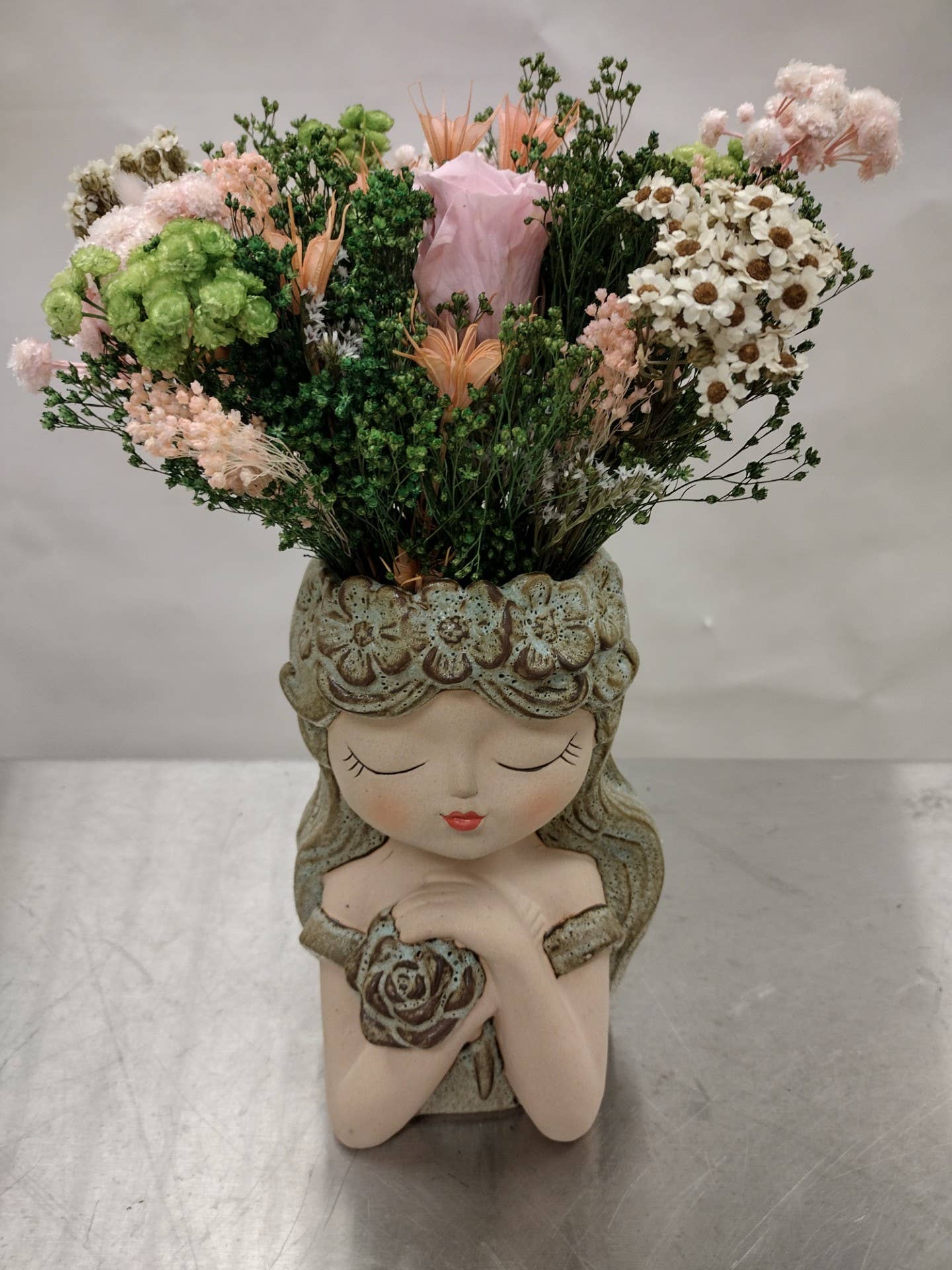 Planter, Girl w/ Crossed Arms Holding Flower Item # 17122