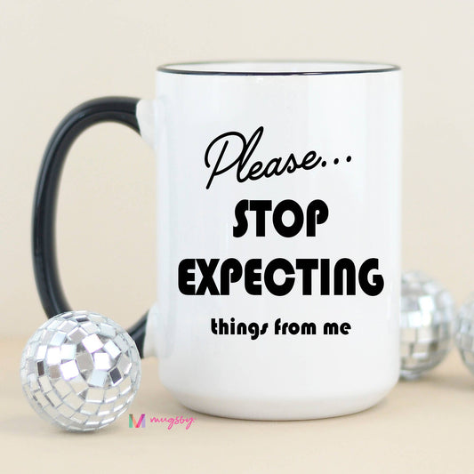 Please Stop Expecting Things Funny Coffee Mug: Black Rim/Handle / 15oz