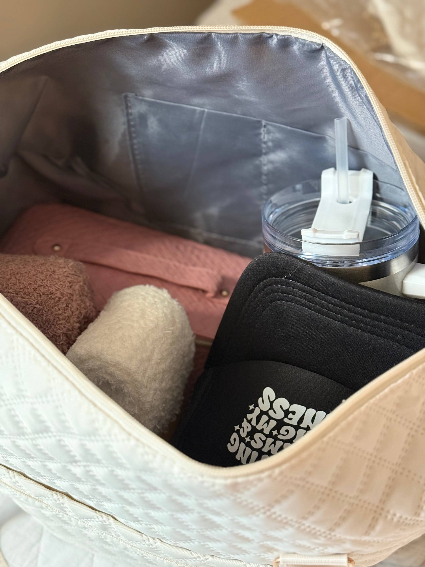 Quilted Overnight Duffle with trolly sleeve : Off White